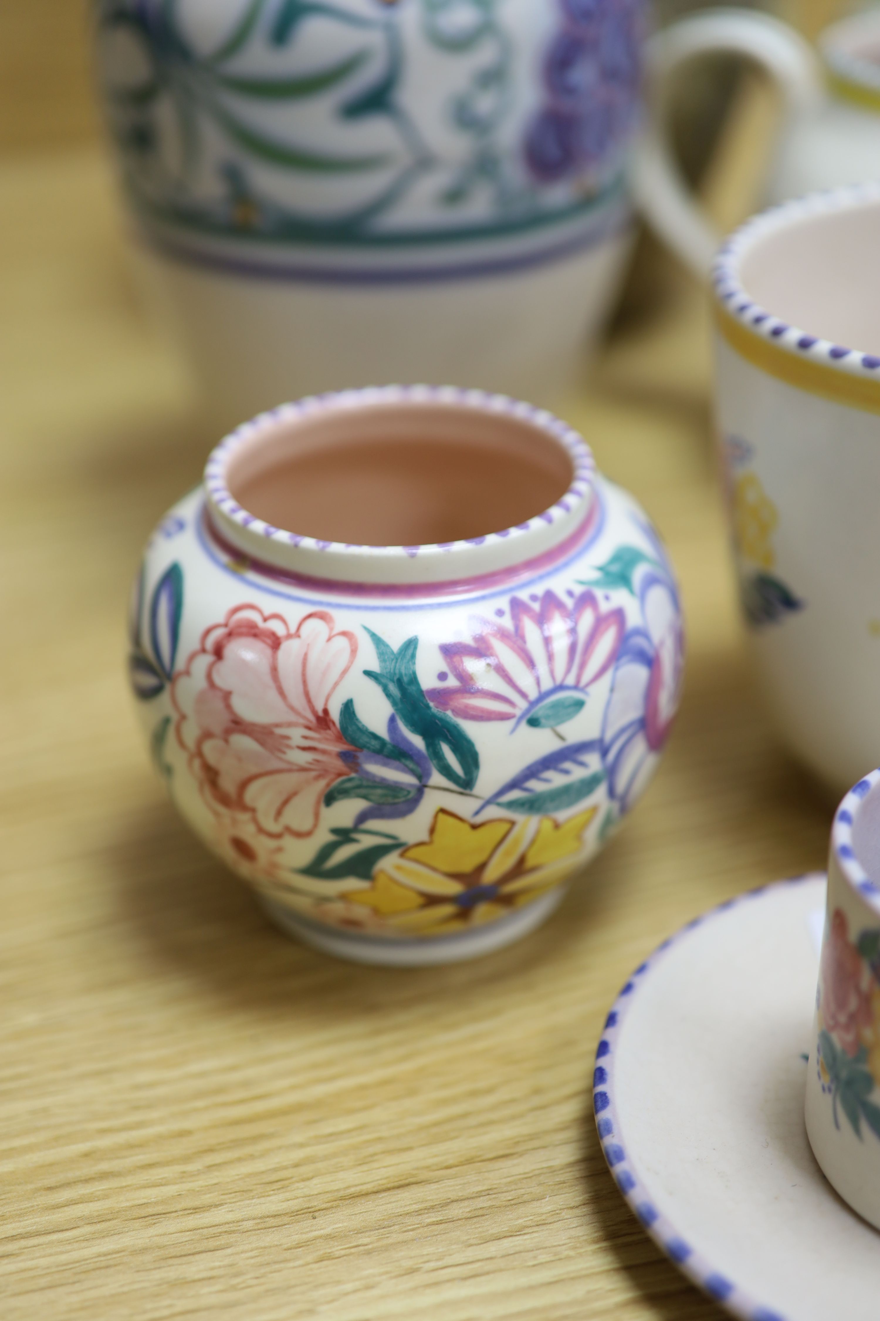 Eight pieces of Poole pottery, a Cranston vase and one other